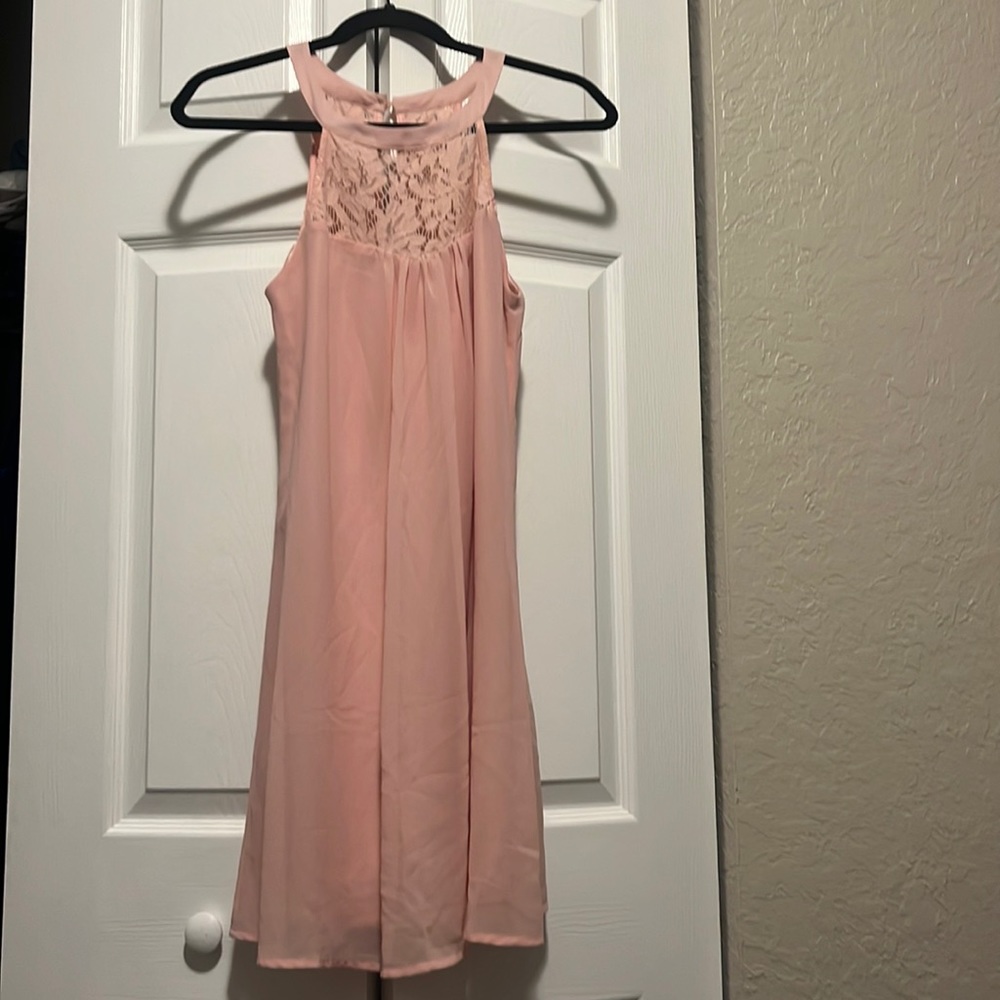 pink sleeveless summer dress perfect for beach wedding or event